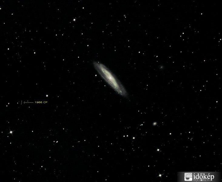 Az M98-as Galaxis + 1966 CF Kisbolygó
