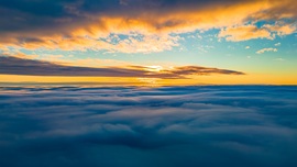 Köd feletti napnyugta