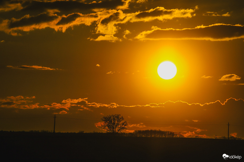 Aranyórás Naplemente