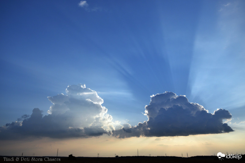 Felhő árnyék és tyndall sugarak